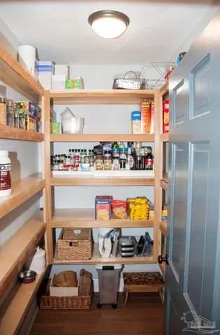 a room with lots of different colored cloths