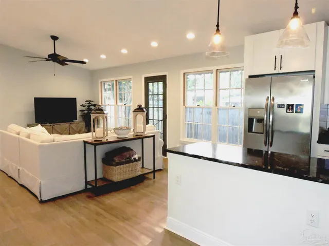 a view of living room with furniture and flat screen tv