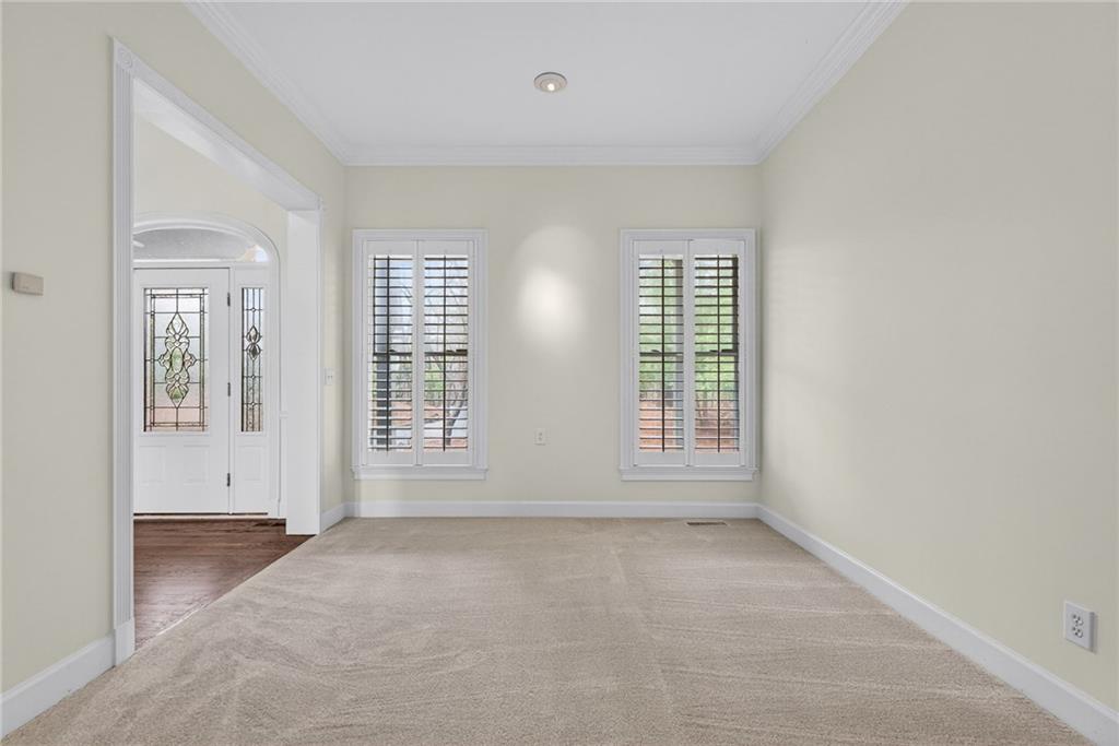 1027 Hunters Trace Jasper, GA 30143 - Photo 29 of 70 an empty room with windows