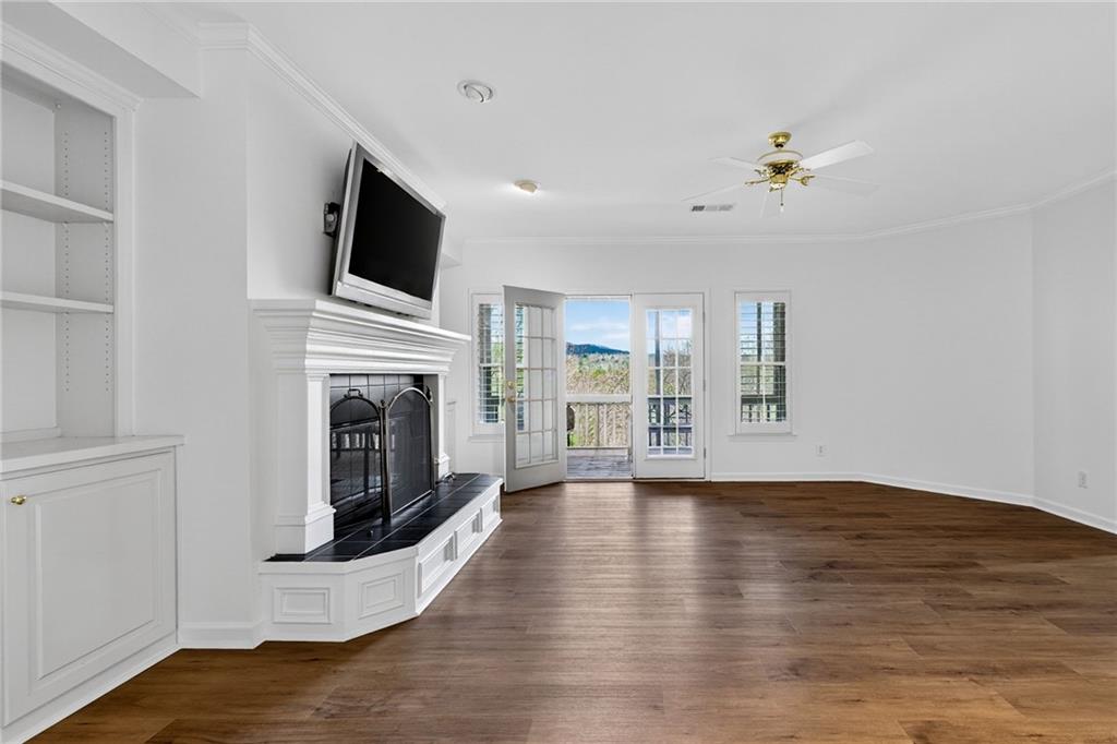 1027 Hunters Trace Jasper, GA 30143 - Photo 59 of 70 a view of a livingroom with an empty space and a fireplace