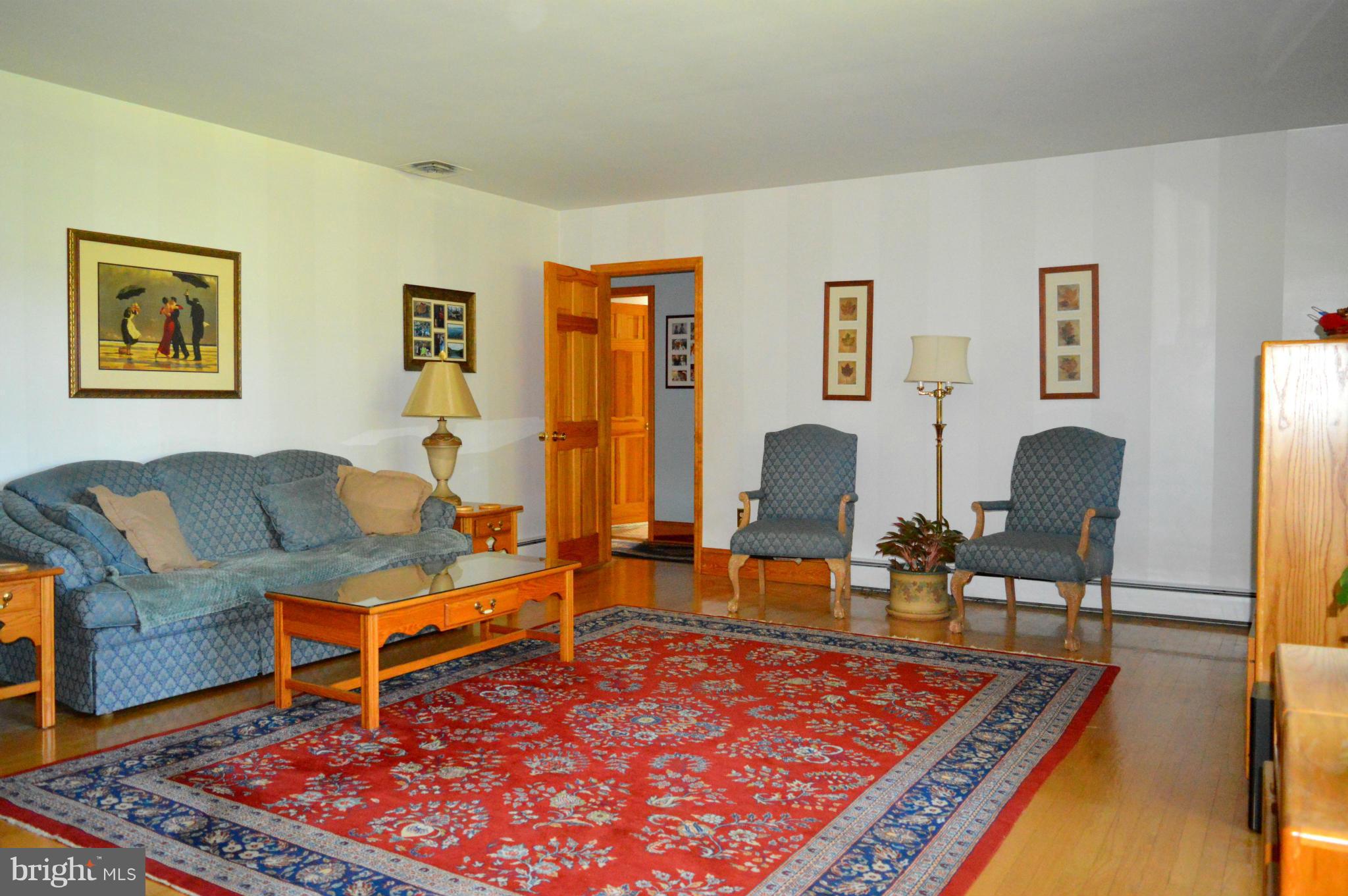 1611 South Rolling Road Baltimore, MD 21227 - Photo 15 of 30 Living Room W/FIREPLACE AND HARDWOOD