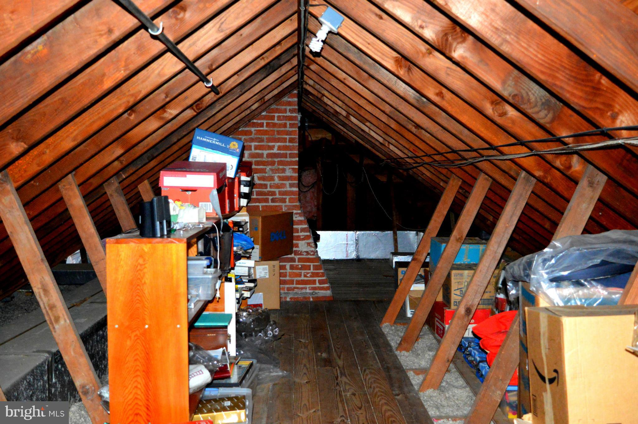 1611 South Rolling Road Baltimore, MD 21227 - Photo 24 of 30 Lots of storage in the attic.