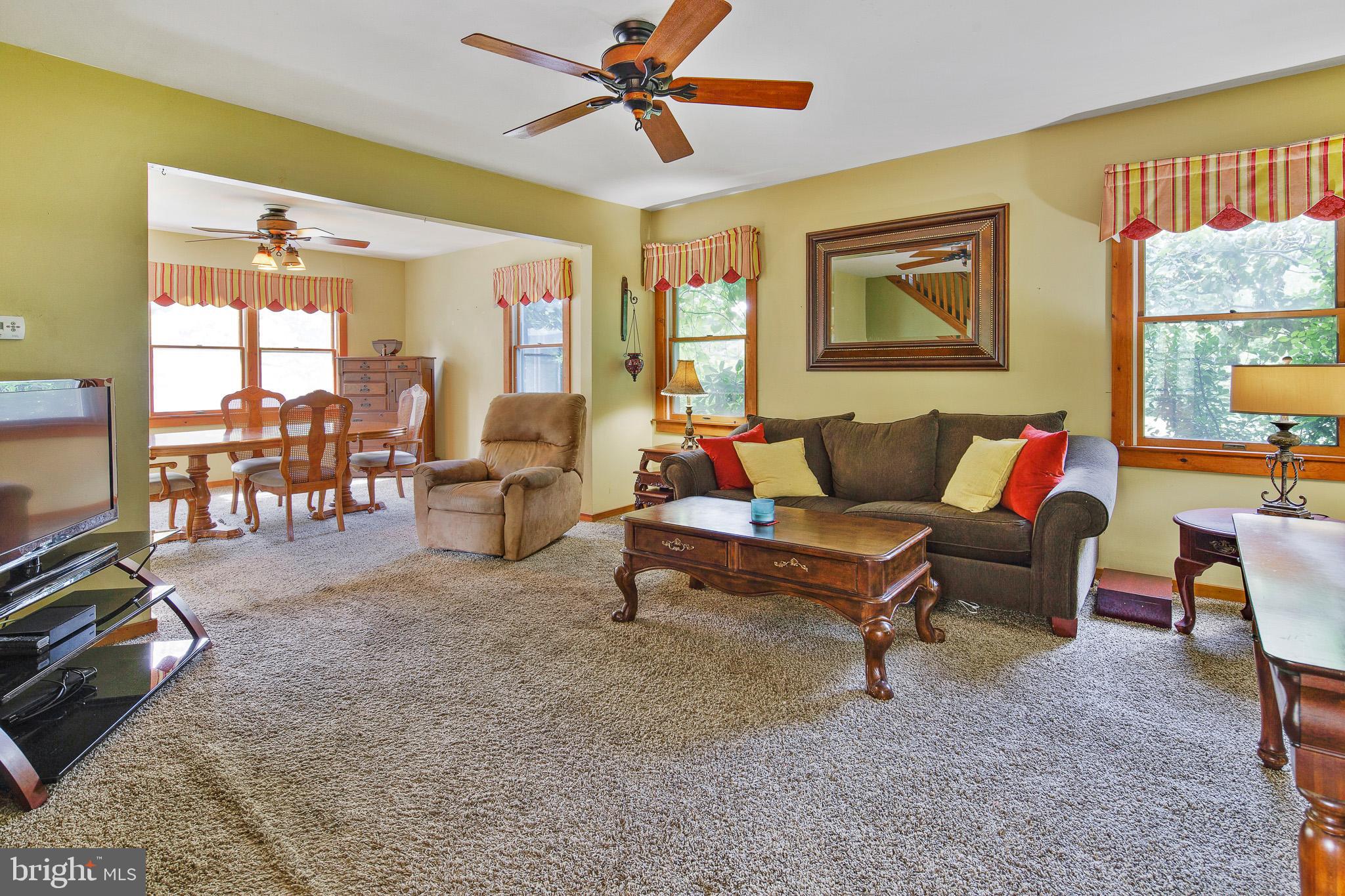 451 Jackson Road Sewell, NJ 08080 - Photo 11 of 35 living room open to formal dining room