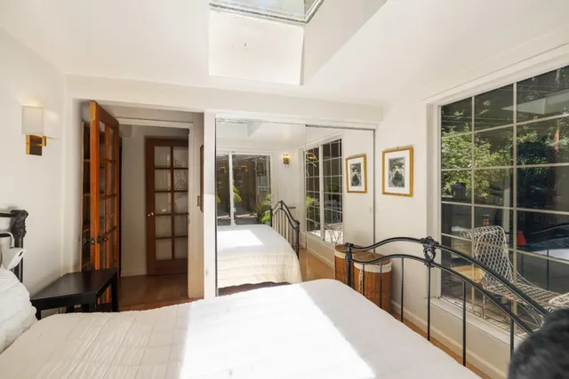 a view of a living room and bathroom