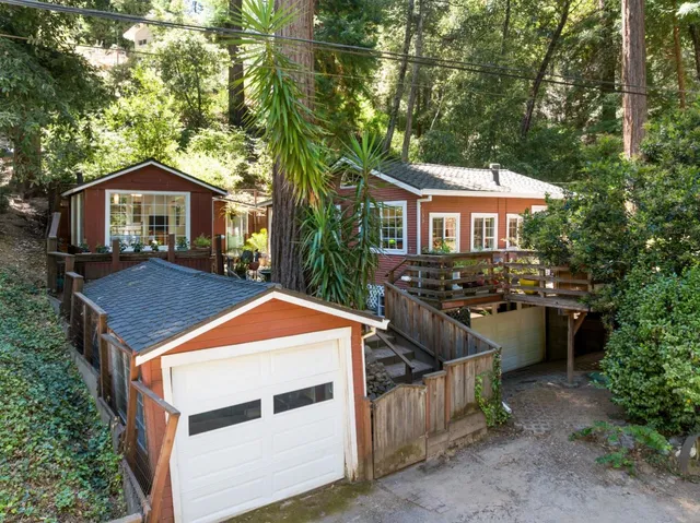 a front view of a house with a garage