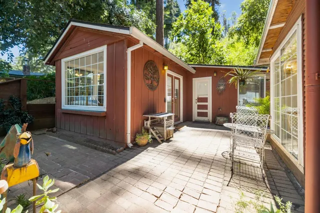 a view of backyard with a patio