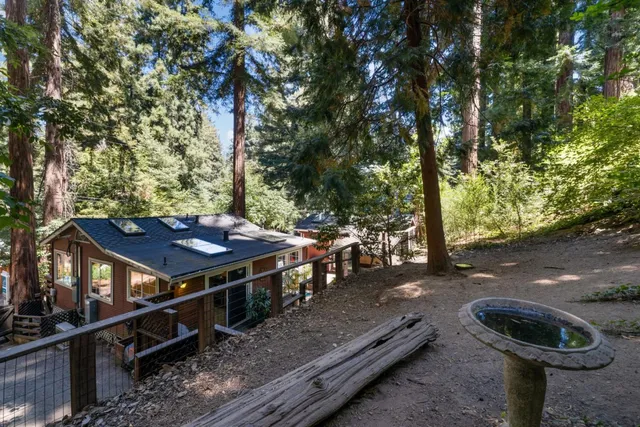 a view of a patio with chairs and table
