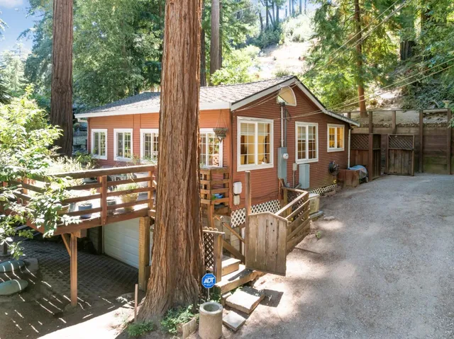 an aerial view of residential house with outdoor space