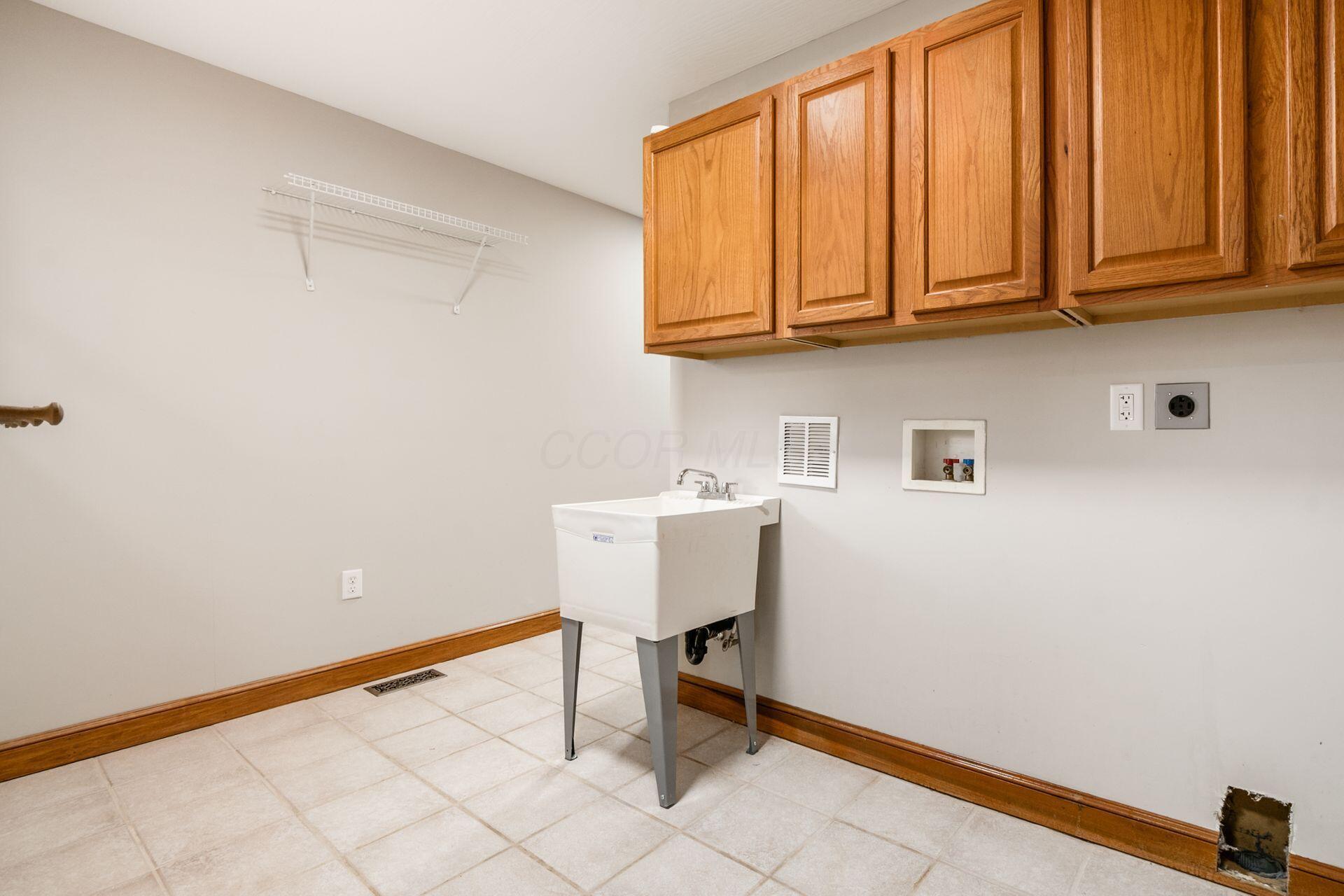 277 Cherrington Road Westerville, OH 43081 - Photo 13 of 60 13 1st floor laundry