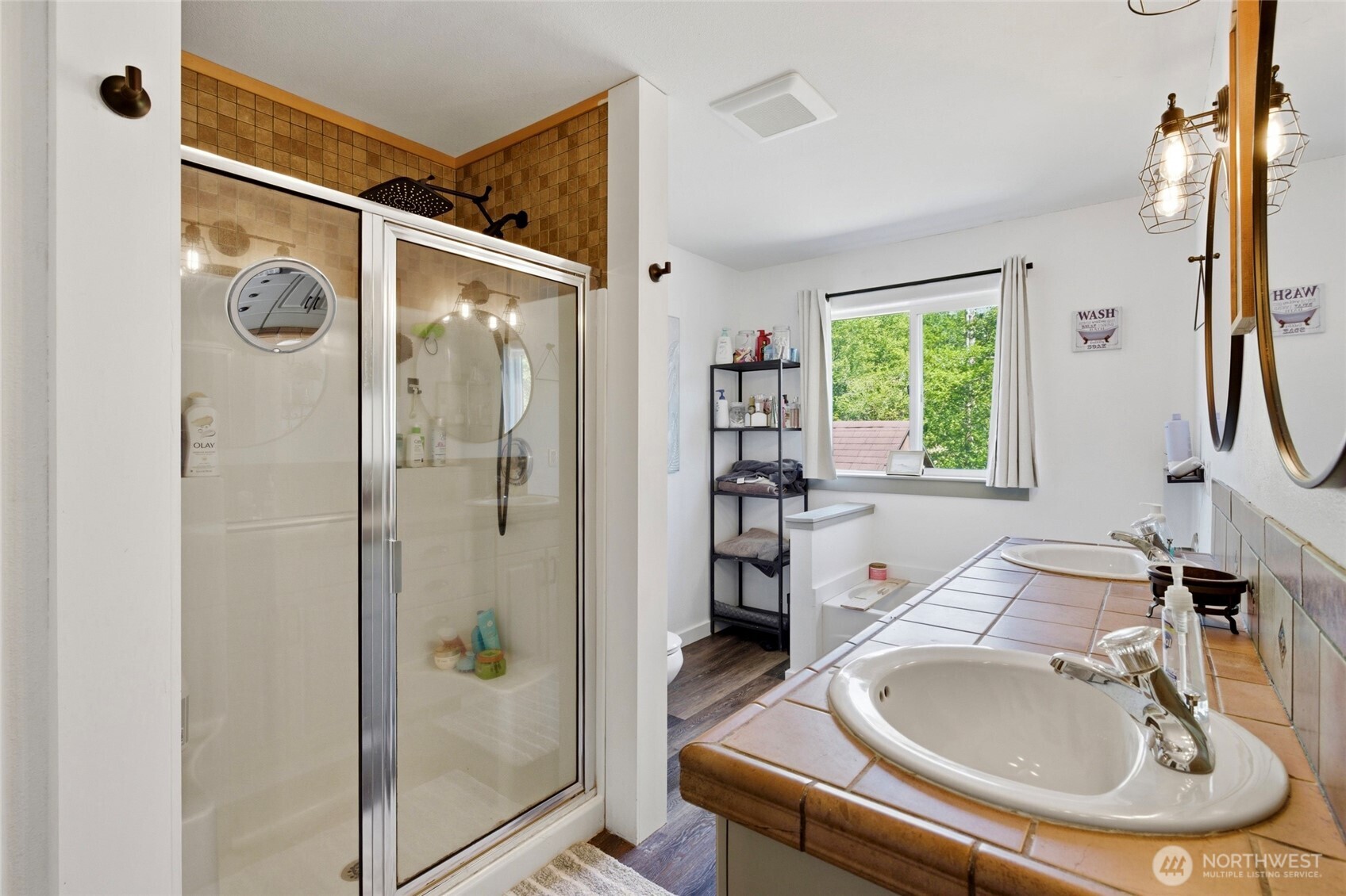 14005 Cedar Court Sultan, WA 98294 - Photo 29 of 38 a bathroom with a sink and a mirror