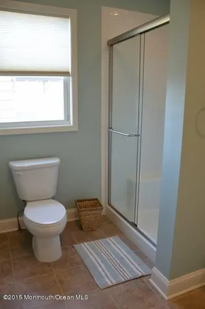 a view of a swimming pool with outdoor seating