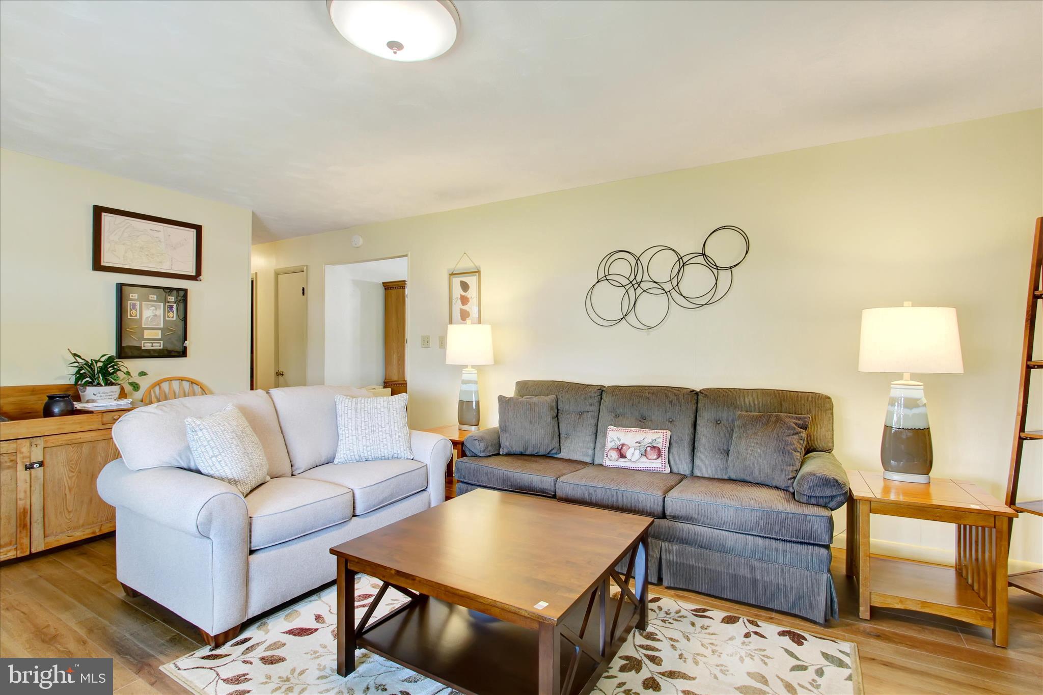 2275 Mummasburg Road Gettysburg, PA 17325 - Photo 7 of 31 a living room with furniture and a couch