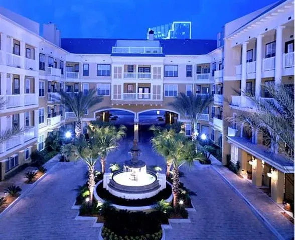 a view of a chairs and table in the patio