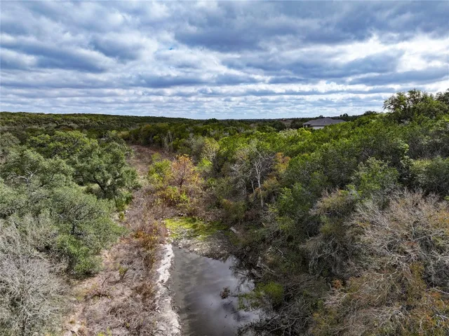 a view of a city with lots of trees