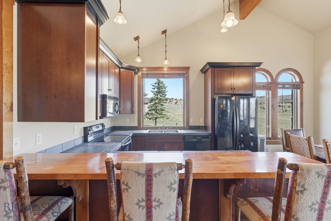 1240 Twin River Cutoff Road Manhattan, MT 59741 - Photo 68 of 88 Charming guest house kitchen with breakfast bar
