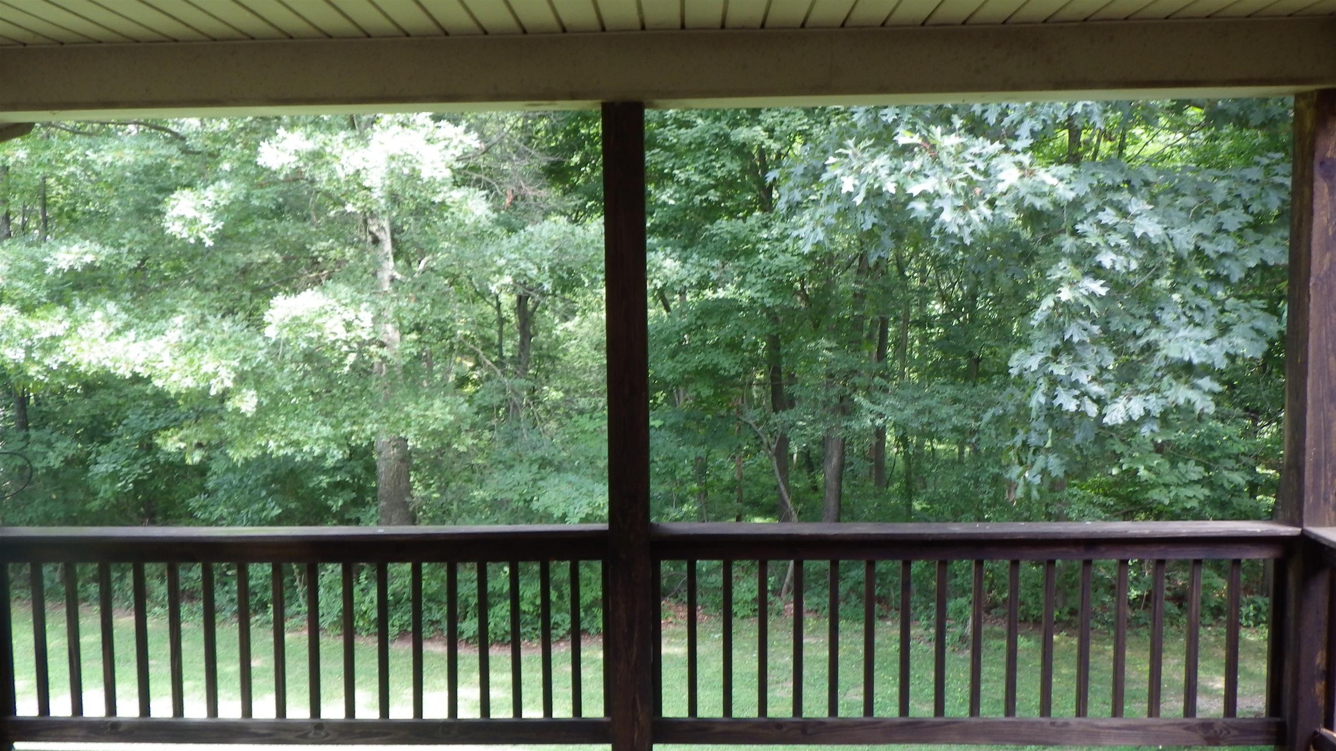 6502 North Pinson Road Portland, TN 37148 - Photo 13 of 22 a view of a forest from a balcony