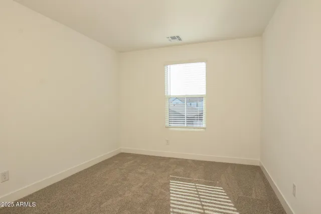 a workspace with furniture and window