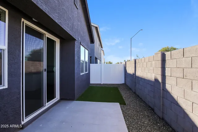 a view of a park with potted plants