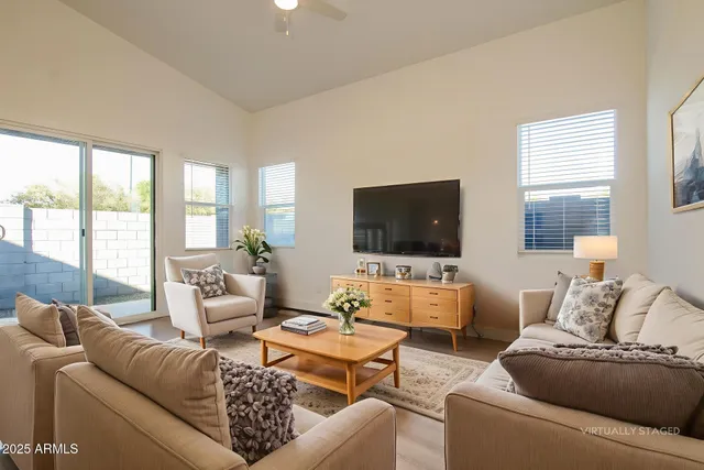 a view of kitchen with wooden floor and electronic appliances