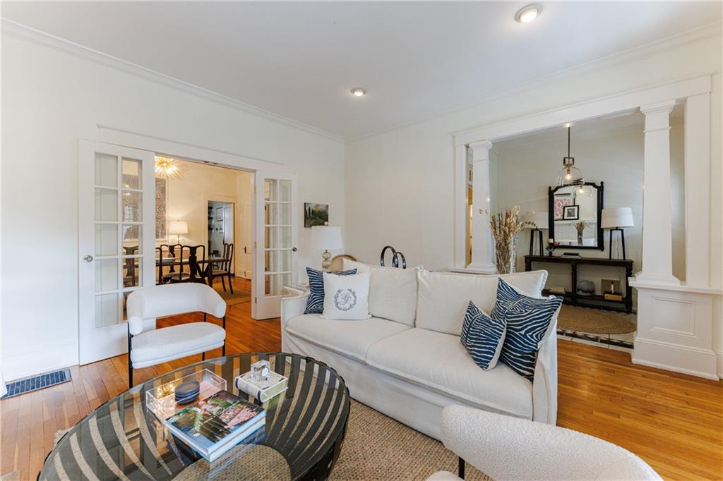 654 Cresthill Avenue Northeast Atlanta, GA 30306 - Photo 12 of 53 a living room with furniture and a large window