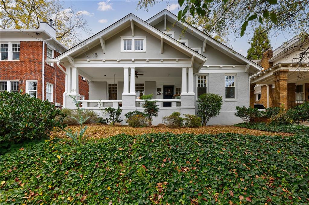 654 Cresthill Avenue Northeast Atlanta, GA 30306 - Photo 2 of 53 a front view of a house with a yard