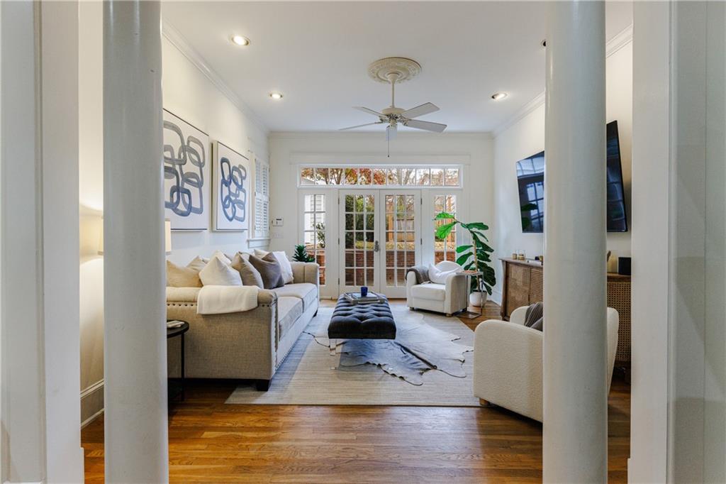 654 Cresthill Avenue Northeast Atlanta, GA 30306 - Photo 21 of 53 a living room with furniture window and wooden floor