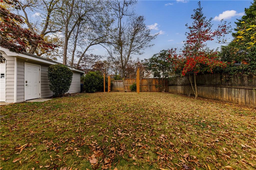 654 Cresthill Avenue Northeast Atlanta, GA 30306 - Photo 24 of 53 a front view of a house with a yard