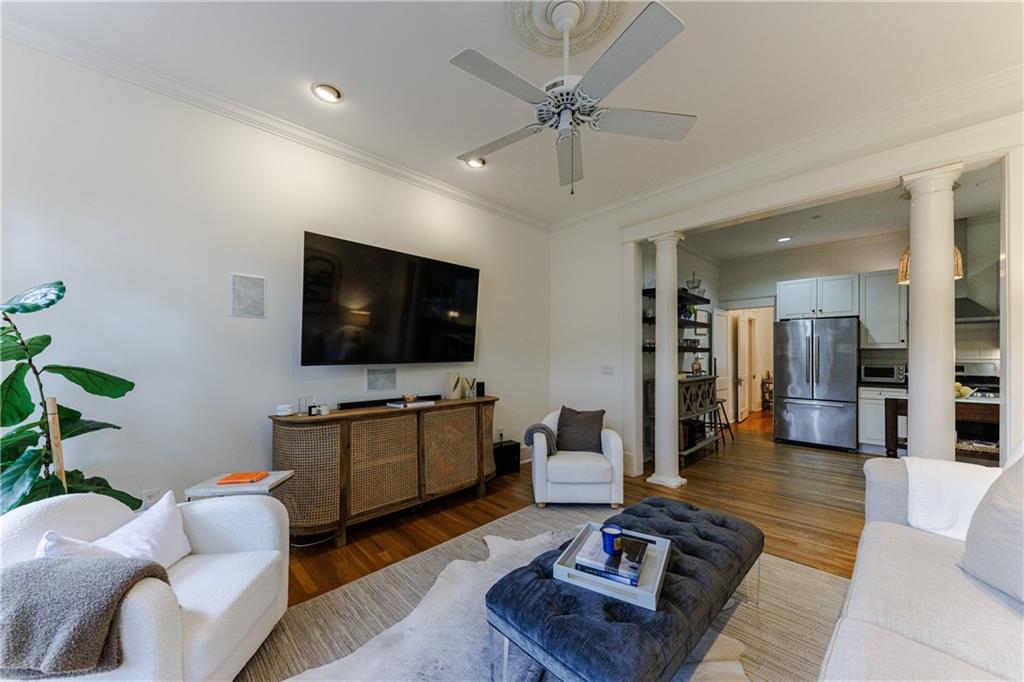 654 Cresthill Avenue Northeast Atlanta, GA 30306 - Photo 28 of 53 a living room with furniture and a flat screen tv