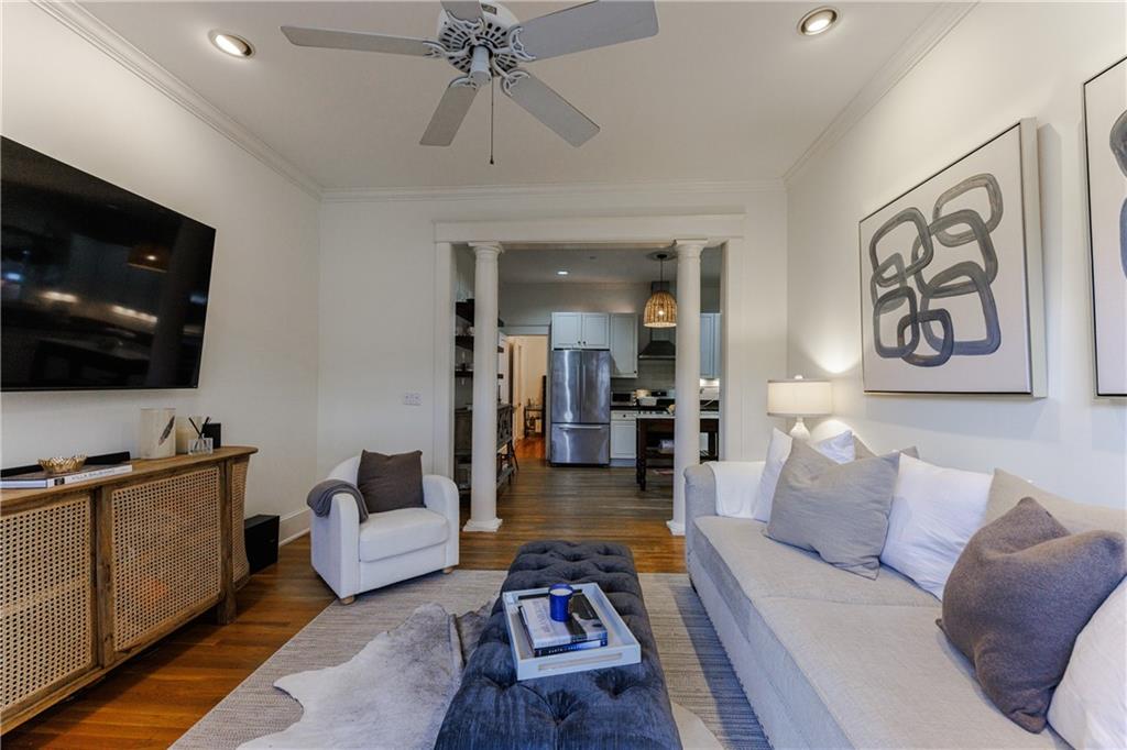 654 Cresthill Avenue Northeast Atlanta, GA 30306 - Photo 29 of 53 a living room with furniture and a flat screen tv