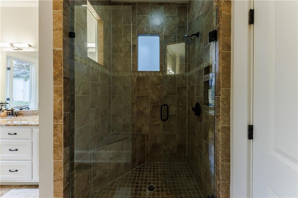 654 Cresthill Avenue Northeast Atlanta, GA 30306 - Photo 34 of 53 a bathroom with a shower