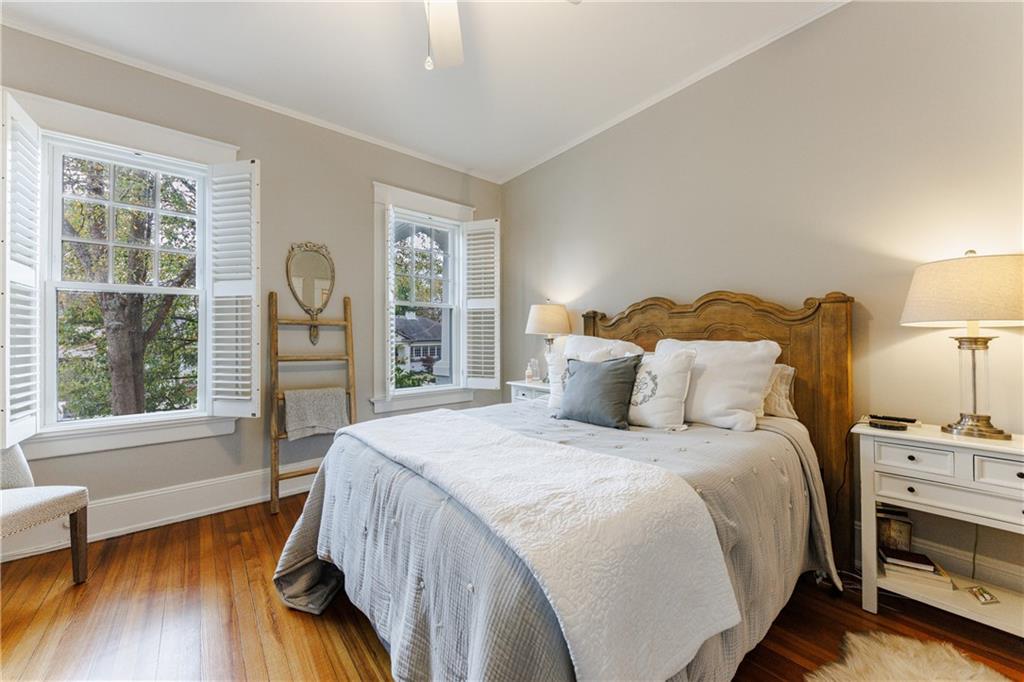 654 Cresthill Avenue Northeast Atlanta, GA 30306 - Photo 41 of 53 a bedroom with a bed and a large window