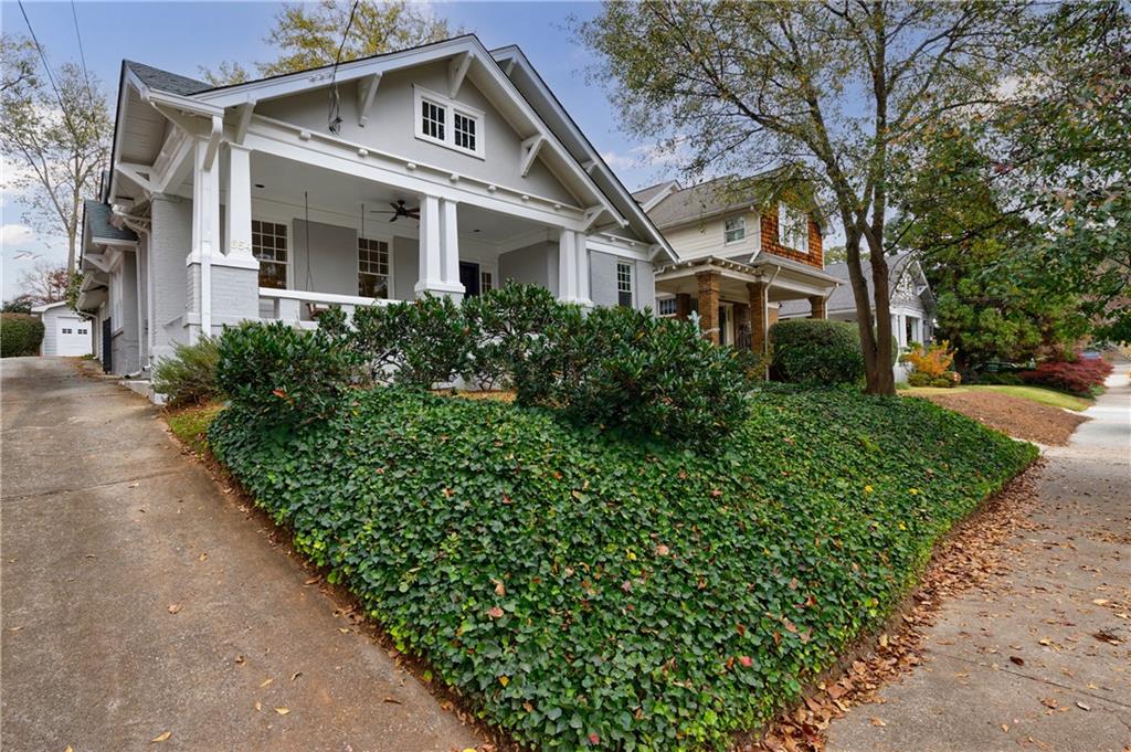 654 Cresthill Avenue Northeast Atlanta, GA 30306 - Photo 49 of 53 a front view of a house with a yard