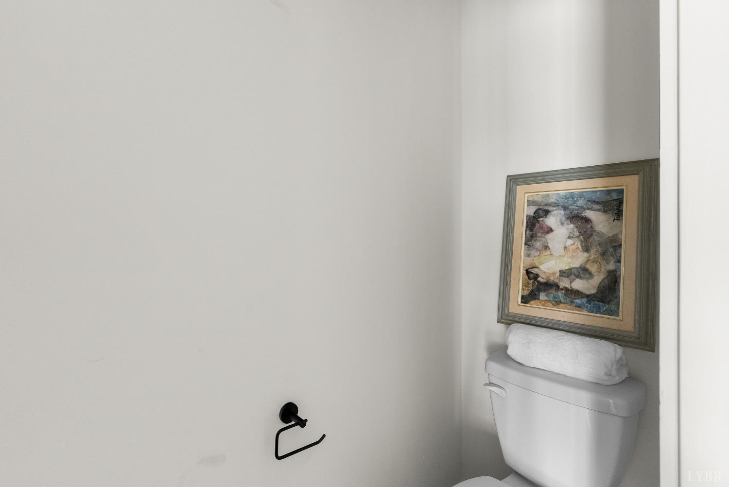 10 Madison Avenue Danville, VA 24540 - Photo 40 of 44 a picture of a bathroom with toilet and a shower