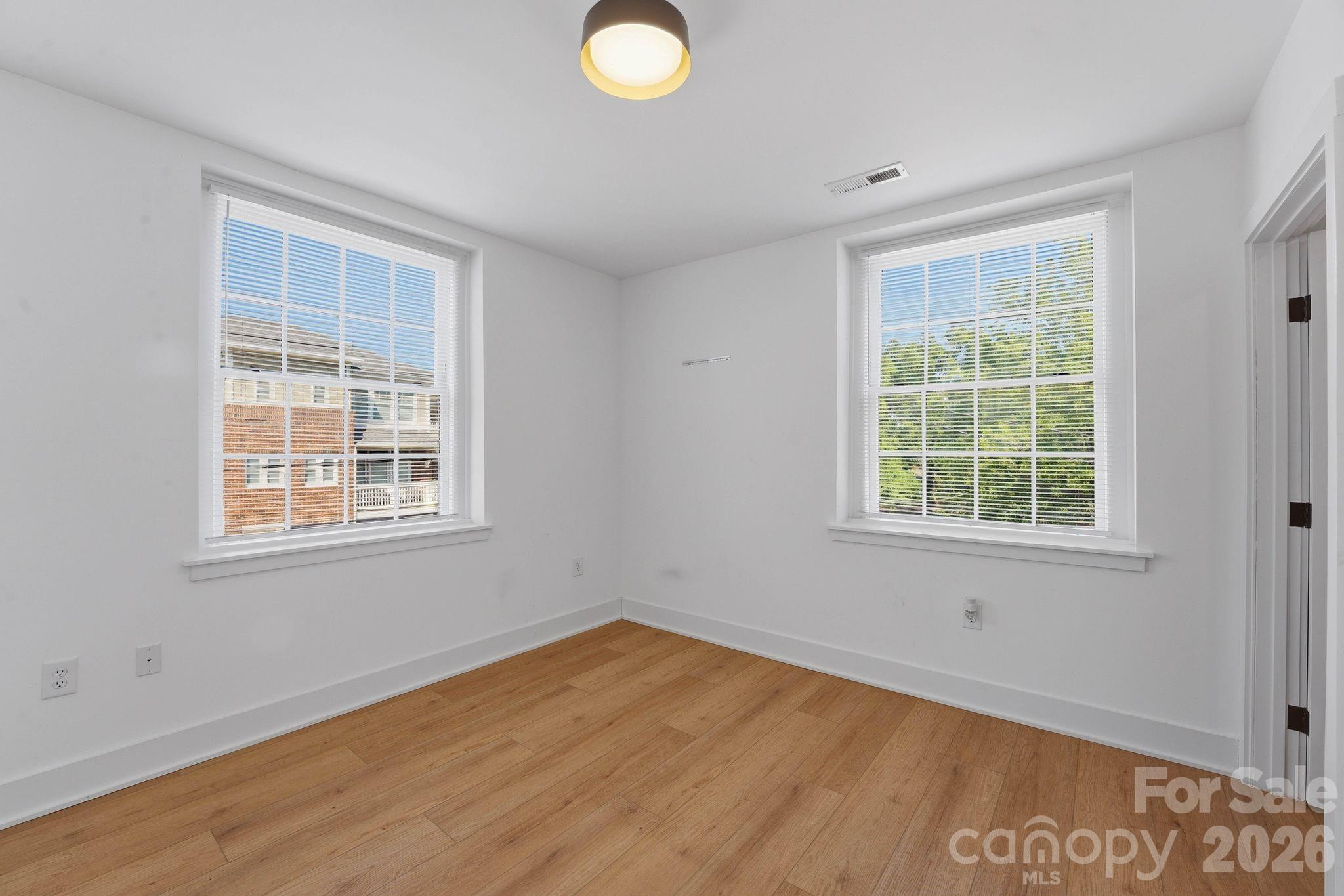 201 Grandin Road, Unit 6 Charlotte, NC 28208 - Photo 16 of 45 an empty room with a window