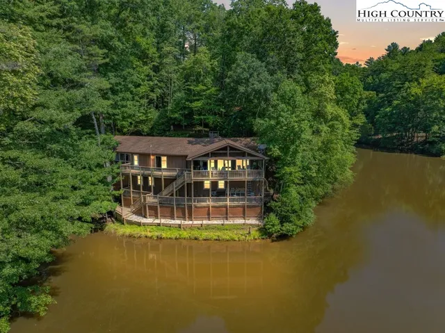 an aerial view of a house with a garden