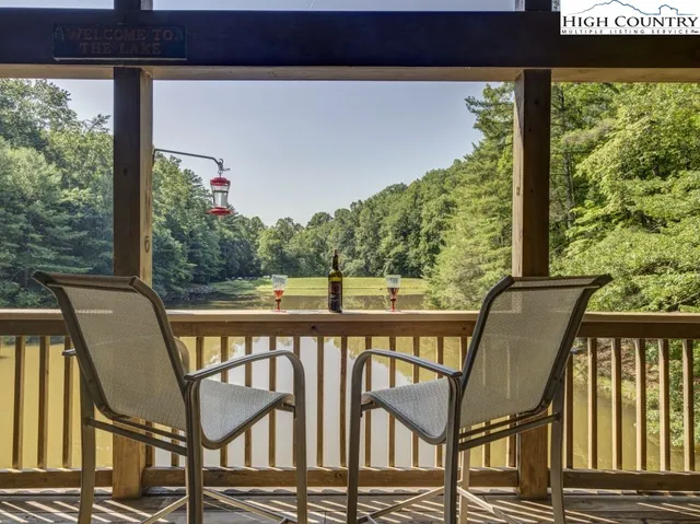 a view of a chair and table in the balcony