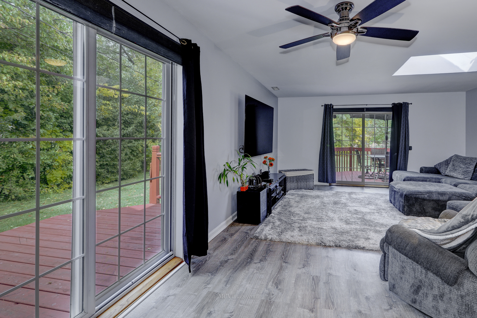 3 Manor Road Lake Zurich, IL 60047 - Photo 13 of 35 a living room with furniture and a large window