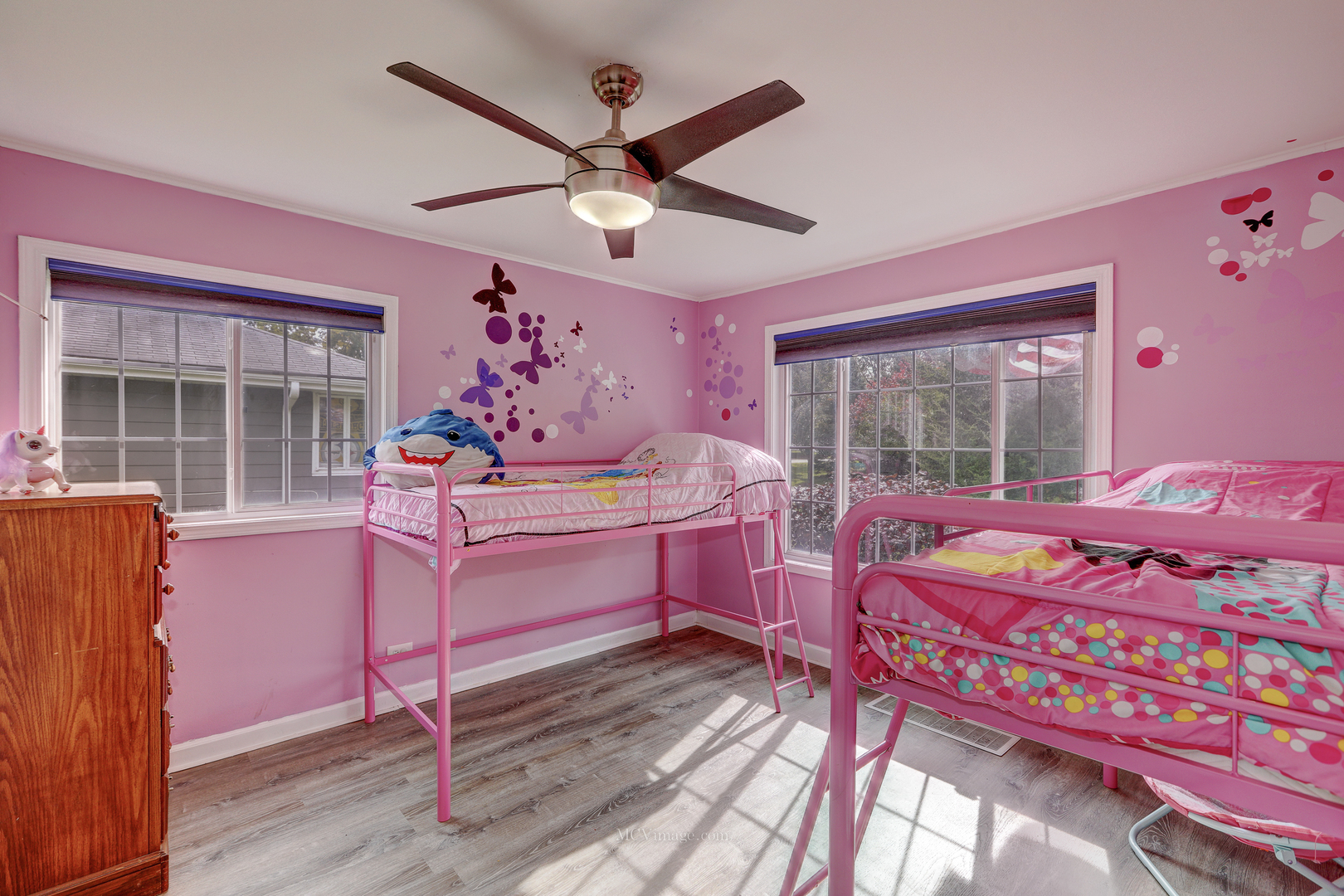 3 Manor Road Lake Zurich, IL 60047 - Photo 16 of 35 a bedroom with a bed and wooden floor