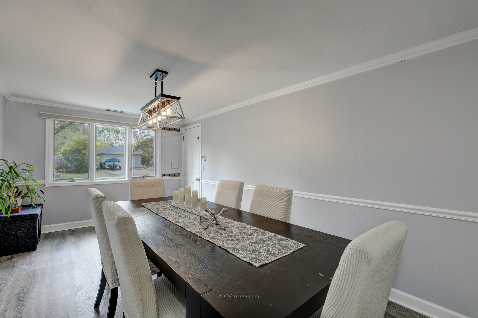 3 Manor Road Lake Zurich, IL 60047 - Photo 10 of 35 a view of a dining room with furniture window and outside view