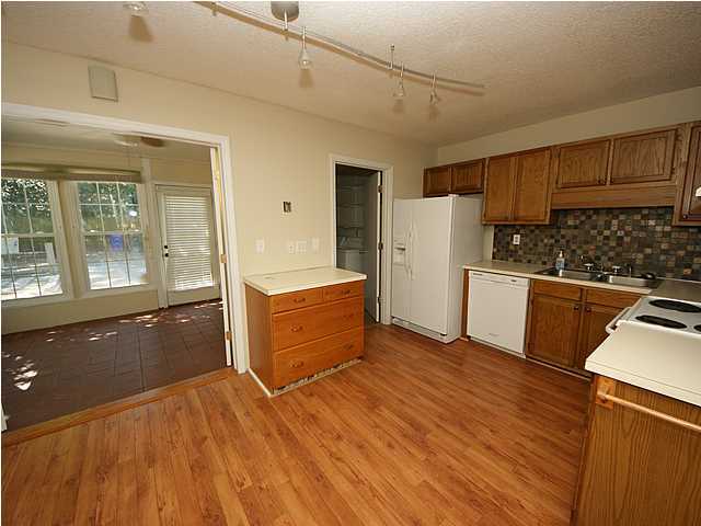1391 Camp Road, Unit A Charleston, SC 29412 - Photo 9 of 19 Kitchen leading to Sunroom