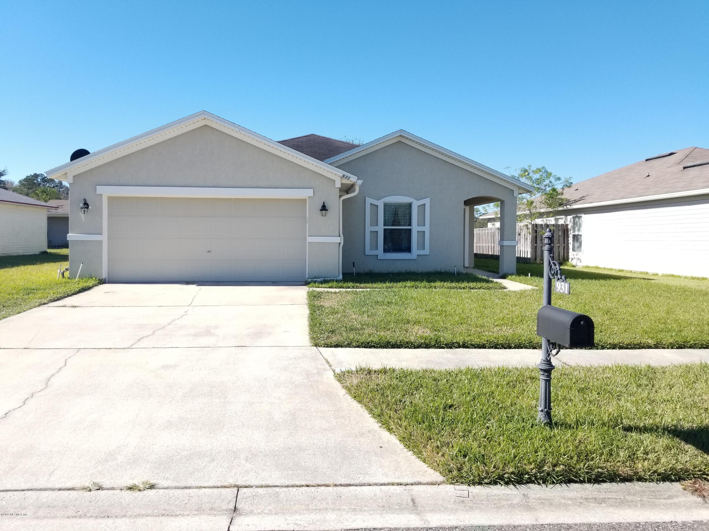 931 Morning Light Road Jacksonville, FL 32218 - Photo 2 of 33 a front view of house with yard