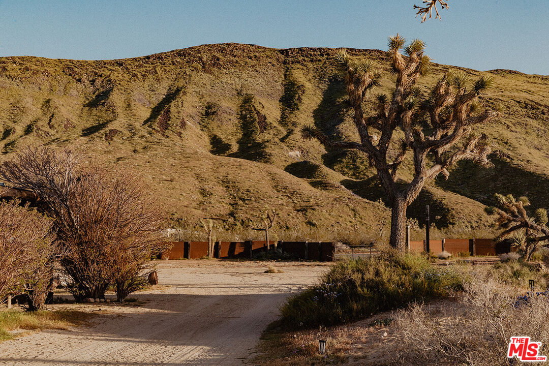 55626 Pipes Canyon Road Yucca Valley, CA 92284 - Photo 29 of 61 a view of a building with a snow