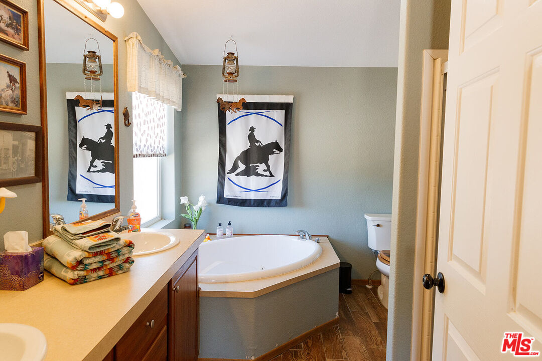 55626 Pipes Canyon Road Yucca Valley, CA 92284 - Photo 44 of 61 a bathroom with a sink and a washing machine