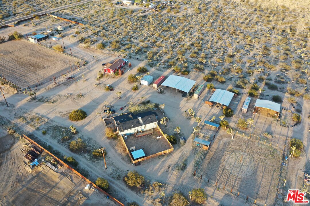 55626 Pipes Canyon Road Yucca Valley, CA 92284 - Photo 56 of 61 an aerial view of residential houses with outdoor space