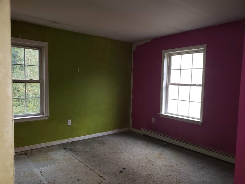 21 Spencer Road Oakham, MA 01068 - Photo 13 of 25 an empty room with a window