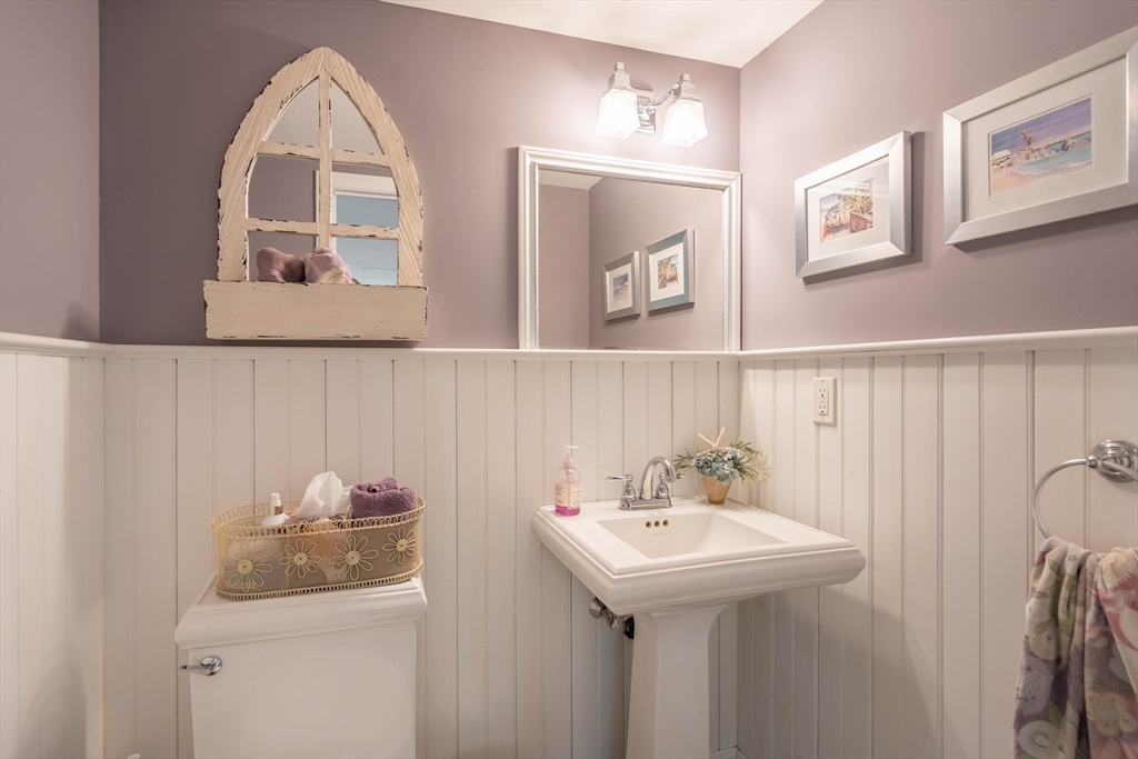 33 Mountain Brook Road Sturbridge, MA 01566 - Photo 11 of 41 a bathroom with a sink and mirror