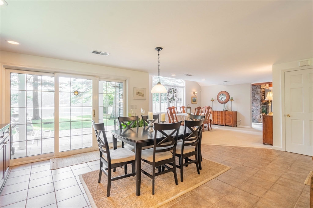 33 Mountain Brook Road Sturbridge, MA 01566 - Photo 12 of 41 a dining room with furniture and window