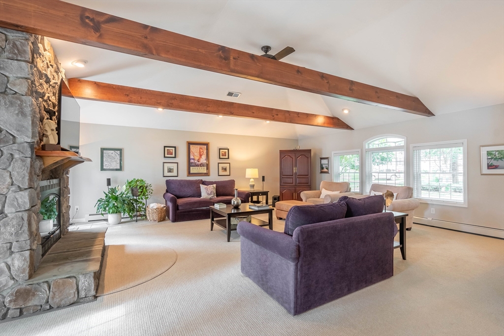 33 Mountain Brook Road Sturbridge, MA 01566 - Photo 15 of 41 a living room with furniture and a large window