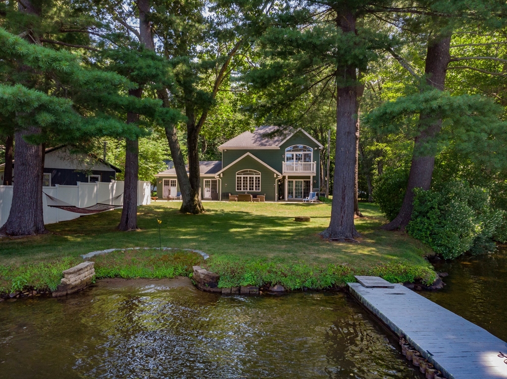 33 Mountain Brook Road Sturbridge, MA 01566 - Photo 39 of 41 a front view of a house with garden
