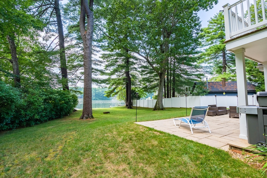 33 Mountain Brook Road Sturbridge, MA 01566 - Photo 4 of 41 a view of a backyard with a patio